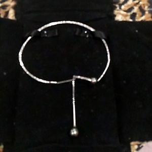 CUSTOM by yours truly. Neck wire with tahitian pearls.